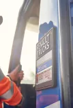Driver going into an electric truck Renault Trucks D