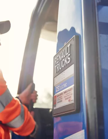 Driver going into an electric truck Renault Trucks D